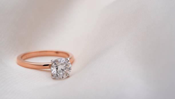 legant Rose Gold Solitaire Engagement Ring: A captivating diamond on a rose gold band, radiating beauty and romance