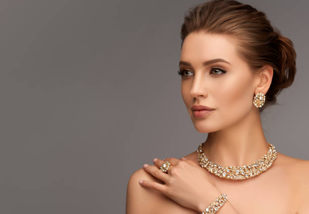 Stunning woman adorned with exquisite diamond jewelry, wearing a captivating chunky necklace, matching bracelet, and elegant earrings, radiating timeless elegance and sophistication